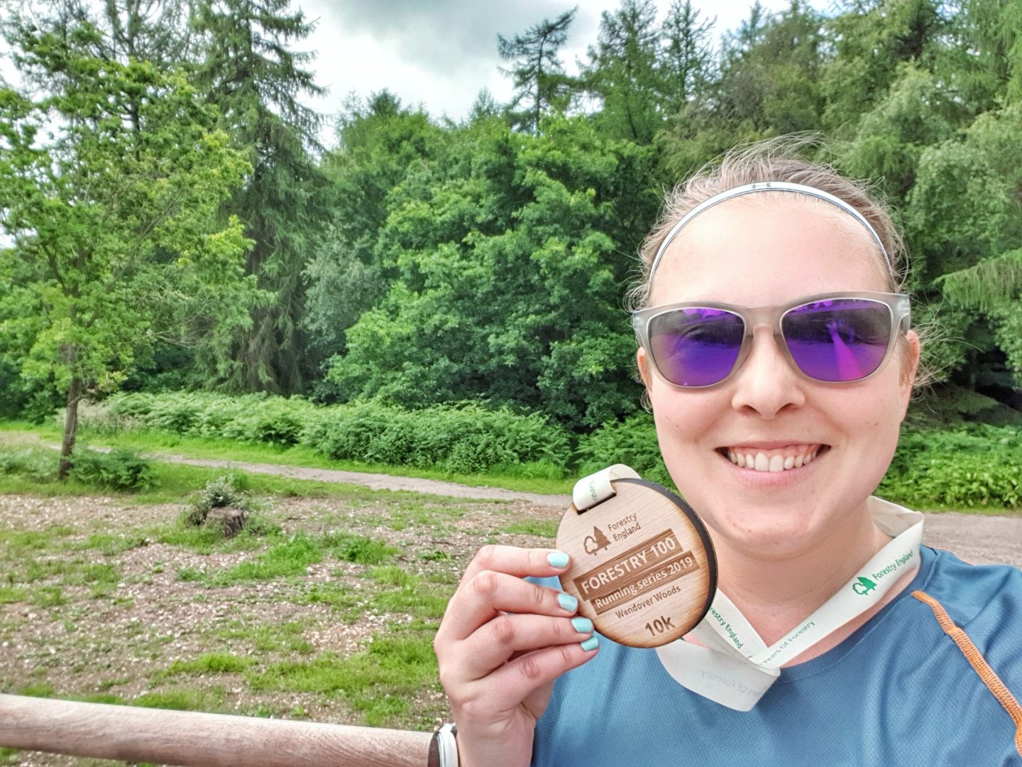 Selfie with wooden medal at Wendover Woods 10k